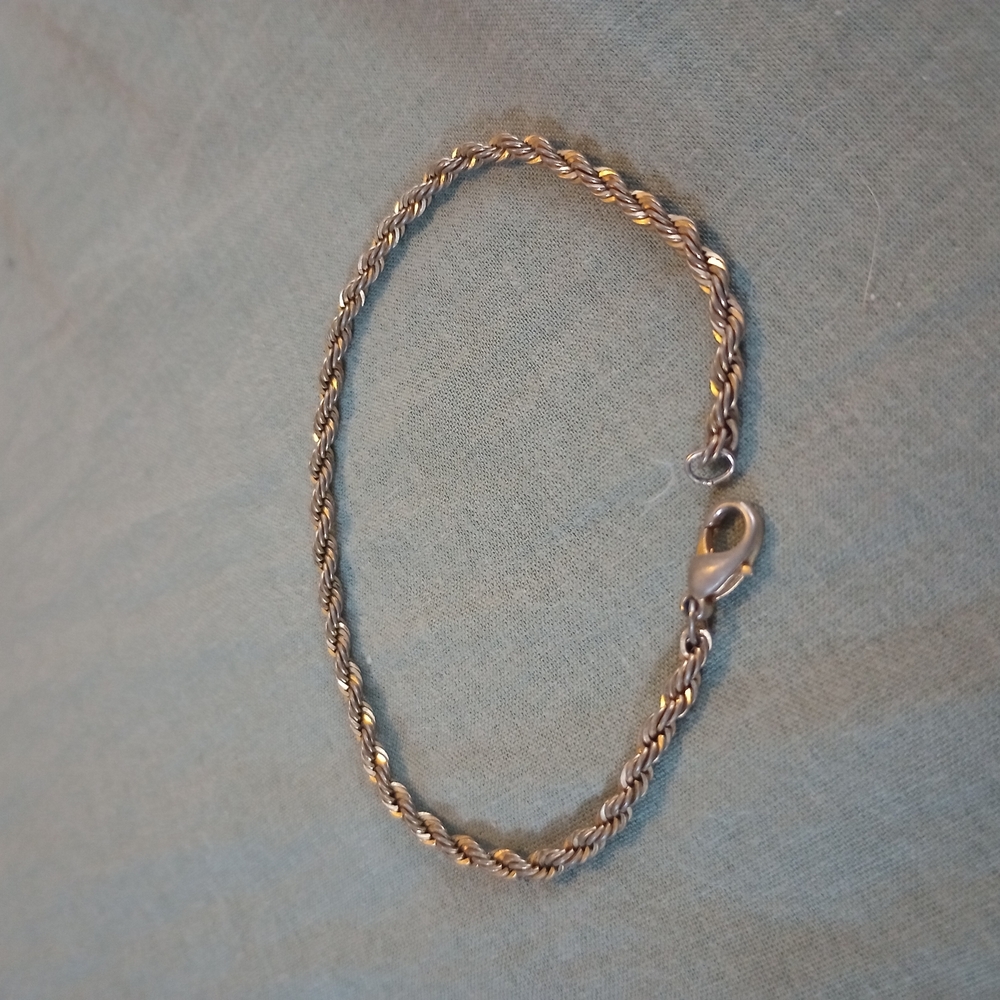 Elegant Gold and Silver Twist Bracelet